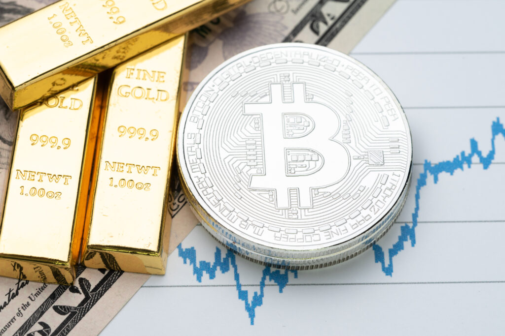 Commodity and alternative asset, gold bar and crypto currency Bitcoin on rising price graph as financial crisis or war safe haven, investment asset or wealth concept.
